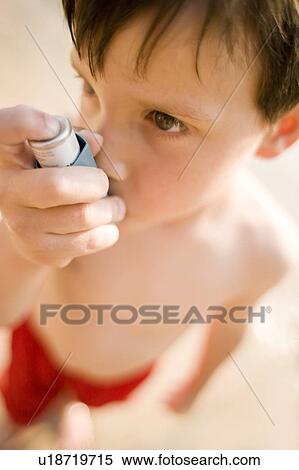 Stock Photography - Asthmatic boy. Fotosearch
