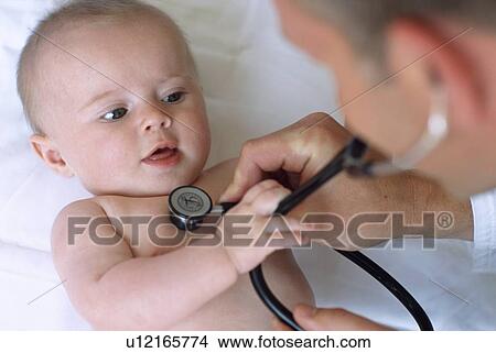 Picture - Baby and doctor. Fotosearch