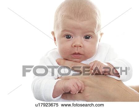 Baby being held View Large Photo Image Stock Photography - Baby being held. Fotosearch