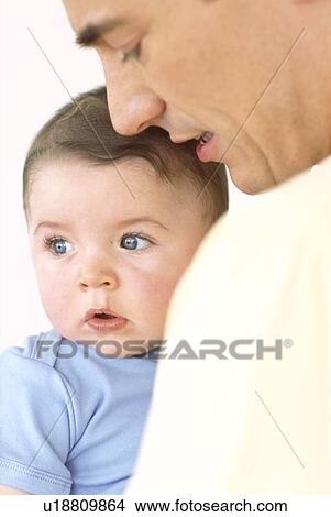 Picture - Baby boy and father. Fotosearch