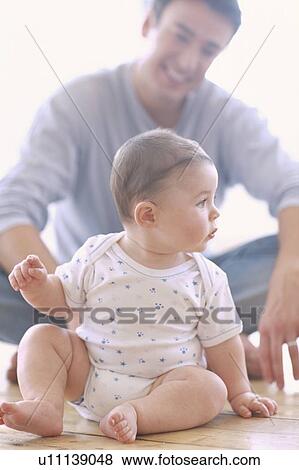 Baby boy and father View Large Photo Image Stock Photo - Baby boy and father. Fotosearch