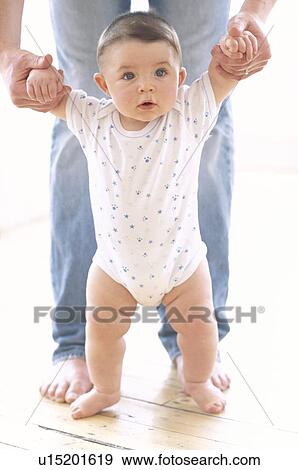 Stock Photo - Baby boy and father. Fotosearch