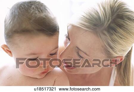 Baby boy and mother View Large Photo Image Stock Image - Baby boy and mother. Fotosearch