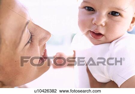 Baby girl and mother View Large Photo Image Stock Image - Baby girl and mother. Fotosearch