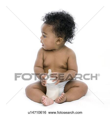 Baby girl with bottle of milk View Large Photo Image Stock Photograph - Baby girl with bottle of milk. Fotosearch