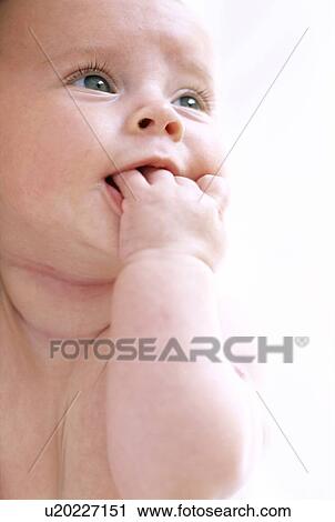 Stock Image - Baby girl's face. Fotosearch