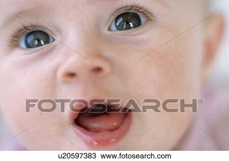 Stock Image - Baby girl's face. Fotosearch