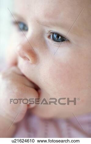 Stock Image - Baby girl's face. Fotosearch