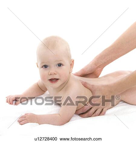 Baby massage View Large Photo Image Stock Image - Baby massage. Fotosearch