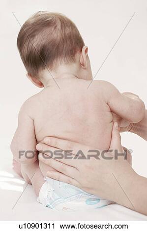 Stock Image - Baby sitting. Fotosearch