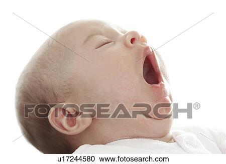 Baby yawning View Large Photo Image Stock Image - Baby yawning. Fotosearch