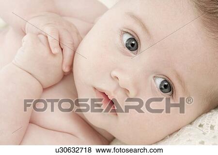 Baby's face and hands View Large Photo Image Stock Photo - Baby's face and hands. Fotosearch