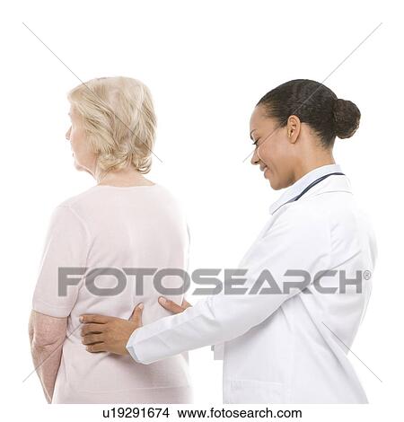 Picture - Back examination. Fotosearch