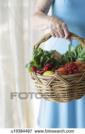 Stock Photo - Basket of fresh fruit and vegetables. Fotosearch
