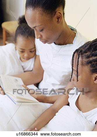 Bedtime reading View Large Photo Image Picture - Bedtime reading. Fotosearch