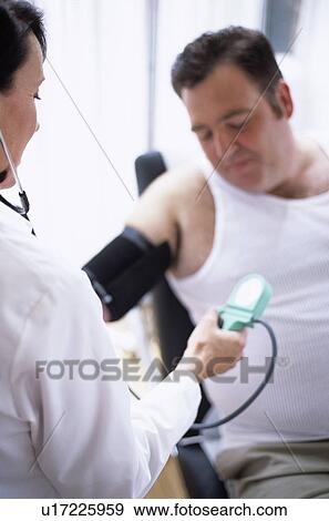 Blood pressure measurement View Large Photo Image Stock Photo - Blood pressure measurement. Fotosearch