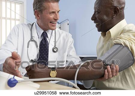 Blood pressure measurement View Large Photo Image Stock Photo - Blood pressure measurement. Fotosearch