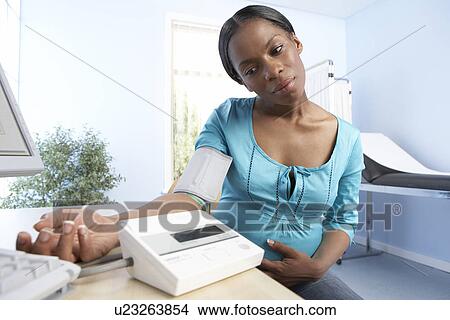Blood pressure test in pregnancy View Large Photo Image Picture - Blood pressure test in pregnancy. Fotosearch
