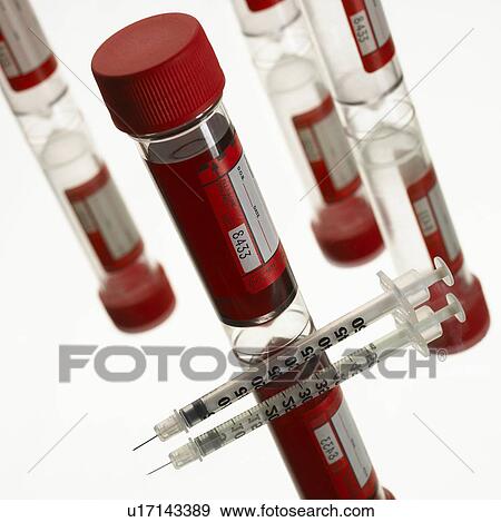 Stock Photo - Blood samples and syringe. Fotosearch