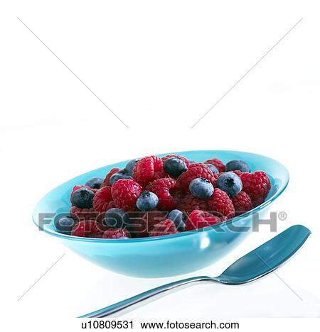 Blueberries and raspberries in a bowl View Large Photo Image Stock Image - Blueberries and raspberries in a bowl. Fotosearch