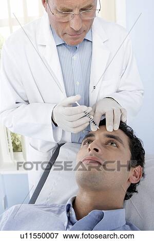 Stock Photo - BOTOX® injection. Fotosearch