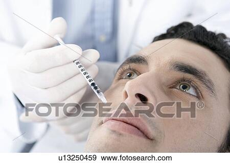 BOTOX® injection View Large Photo Image Stock Photo - BOTOX® injection. Fotosearch