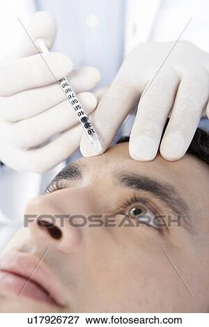 BOTOX® injection View Large Photo Image Stock Photo - BOTOX® injection. Fotosearch