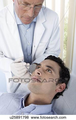 BOTOX® injection View Large Photo Image Stock Photo - BOTOX® injection. Fotosearch