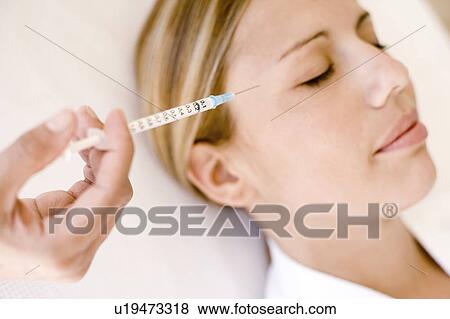 Stock Photo - BOTOX® treatment. Fotosearch