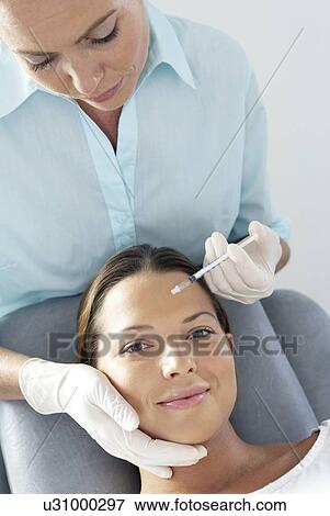 BOTOX® treatment View Large Photo Image Stock Photo - BOTOX® treatment. Fotosearch
