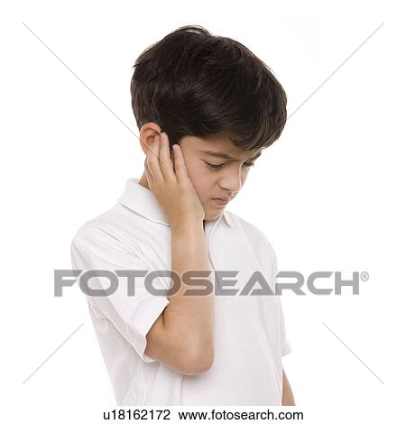 Stock Image - Boy with earache. Fotosearch