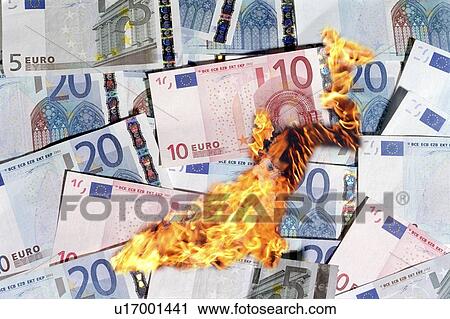 Stock Image - Burning money, conceptual image. Fotosearch