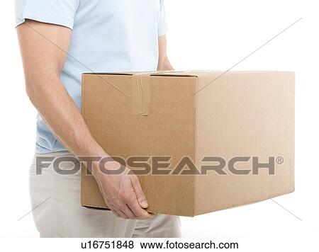 Carrying a box View Large Photo Image Stock Photo - Carrying a box. Fotosearch