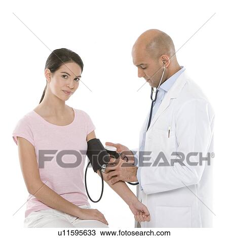 Checking blood pressure View Large Photo Image Stock Image - Checking blood pressure. Fotosearch