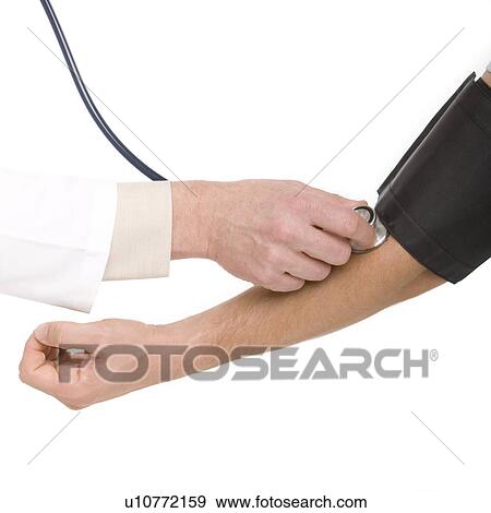 Checking blood pressure View Large Photo Image Stock Photo - Checking blood pressure. Fotosearch