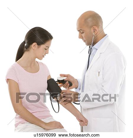 Checking blood pressure View Large Photo Image Stock Photo - Checking blood pressure. Fotosearch