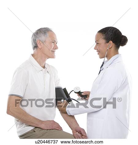 Stock Photo - Checking blood pressure. Fotosearch