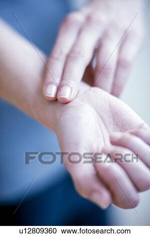 Checking pulse View Large Photo Image Stock Image - Checking pulse. Fotosearch
