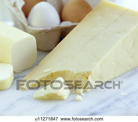 Cheeses and eggs View Large Photo Image Stock Photo - Cheeses and eggs. Fotosearch