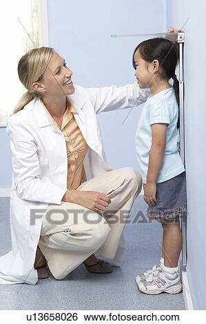 Child height measurement View Large Photo Image Stock Photograph - Child height measurement. Fotosearch