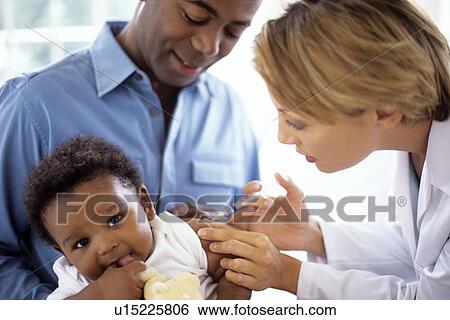 Stock Photograph - Childhood injection. Fotosearch