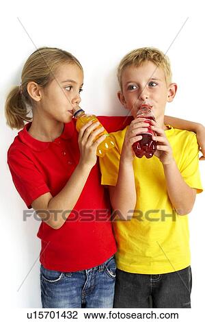Children drinking squash View Large Photo Image Stock Image - Children drinking squash. Fotosearch