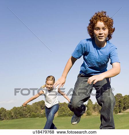 Stock Photo - Children playing. Fotosearch