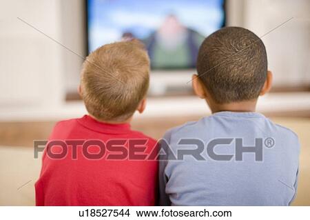 Picture - Children watching television. Fotosearch