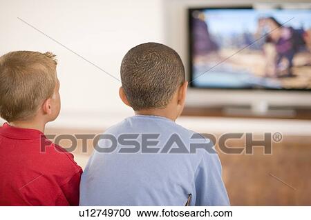 Stock Image - Children watching television. Fotosearch