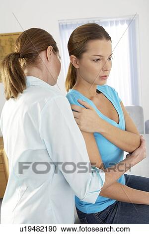 Stock Image - Chiropractic examination. Fotosearch