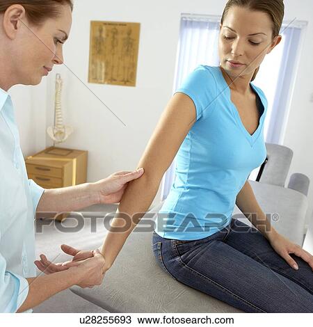 Chiropractic examination View Large Photo Image Stock Image - Chiropractic examination. Fotosearch