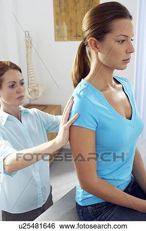 Chiropractic examination View Large Photo Image Stock Photograph - Chiropractic examination. Fotosearch
