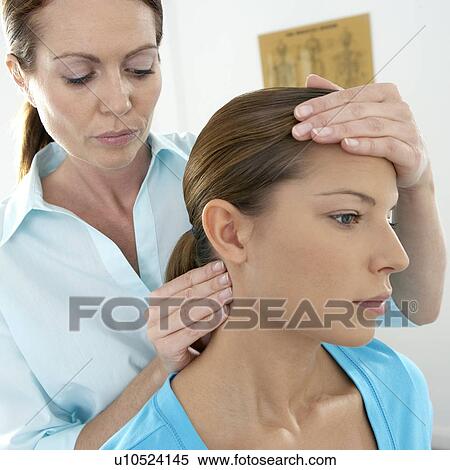Stock Photography - Chiropractic examination. Fotosearch