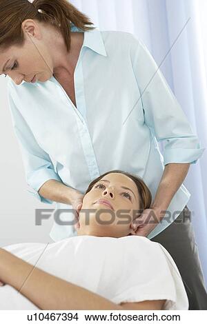 Chiropractic treatment View Large Photo Image Picture - Chiropractic treatment. Fotosearch